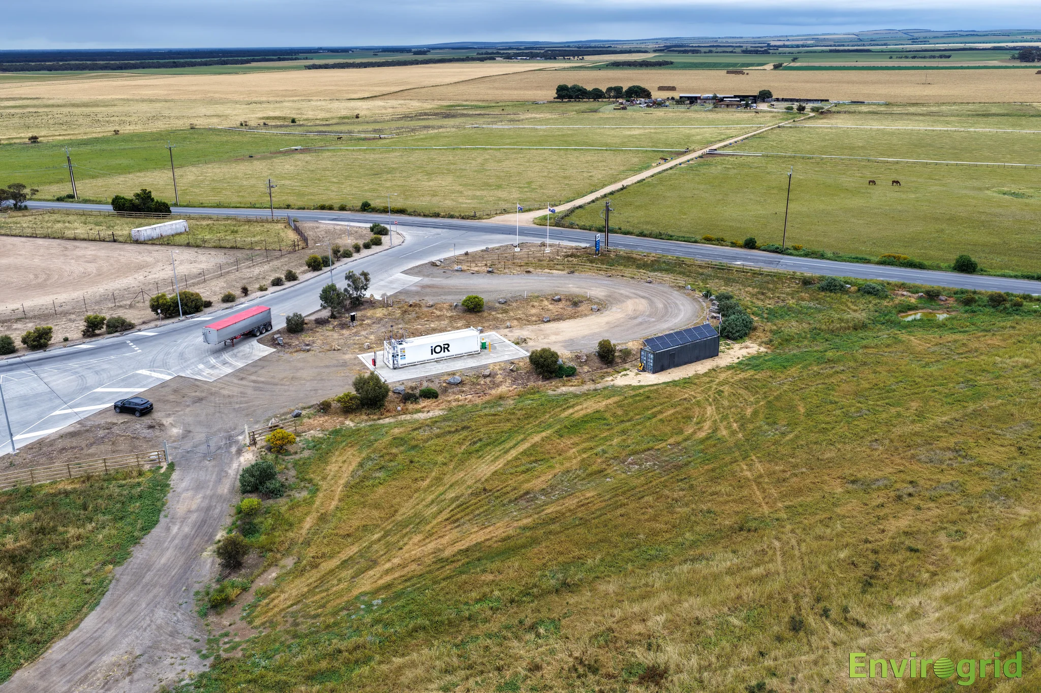 Oblique aerial view of the IOR depot, solar container and surrounding land.